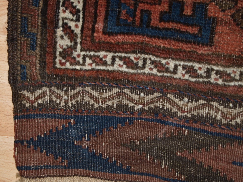 ANTIQUE TIMURI BALUCH MAIN CARPET, WESTERN AFGHANISTAN, CIRCA 1880.  View V