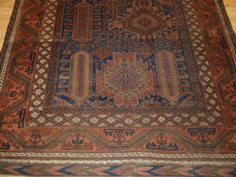 ANTIQUE TIMURI BALUCH MAIN CARPET, WESTERN AFGHANISTAN, CIRCA 1880.  View IX