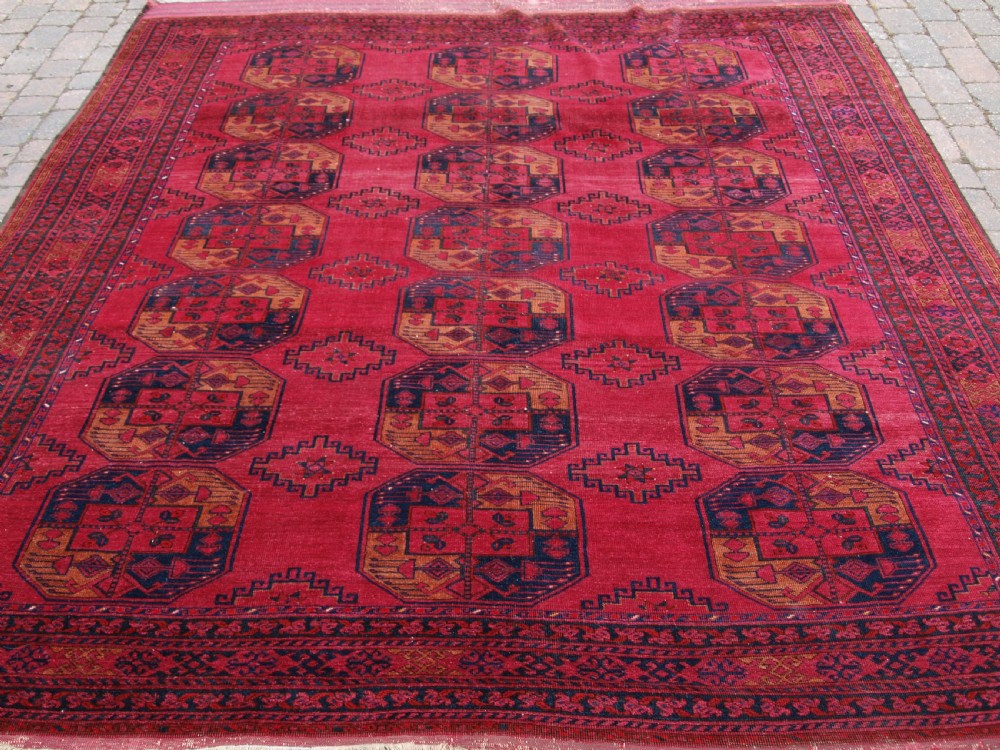 ANTIQUE AFGHAN TURKMEN VILLAGE CARPET, ANDKHOY REGION, CIRCA 1900.