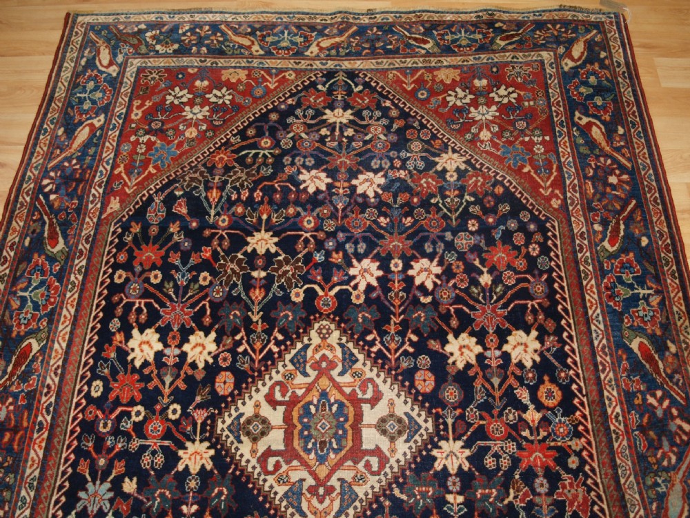 ANTIQUE QASHQAI KASHKULI RUG WITH BIRD BORDER, CIRCA 1900. View IV