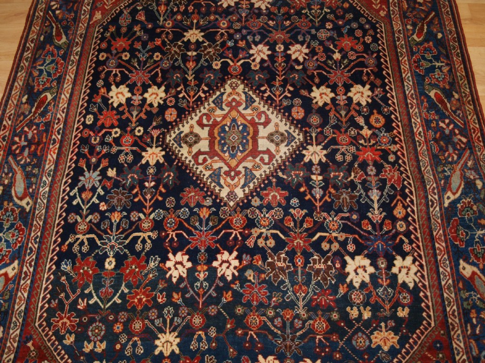 ANTIQUE QASHQAI KASHKULI RUG WITH BIRD BORDER, CIRCA 1900. View V