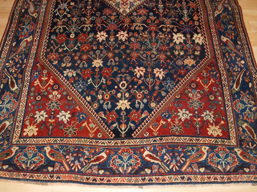 ANTIQUE QASHQAI KASHKULI RUG WITH BIRD BORDER, CIRCA 1900. View VI