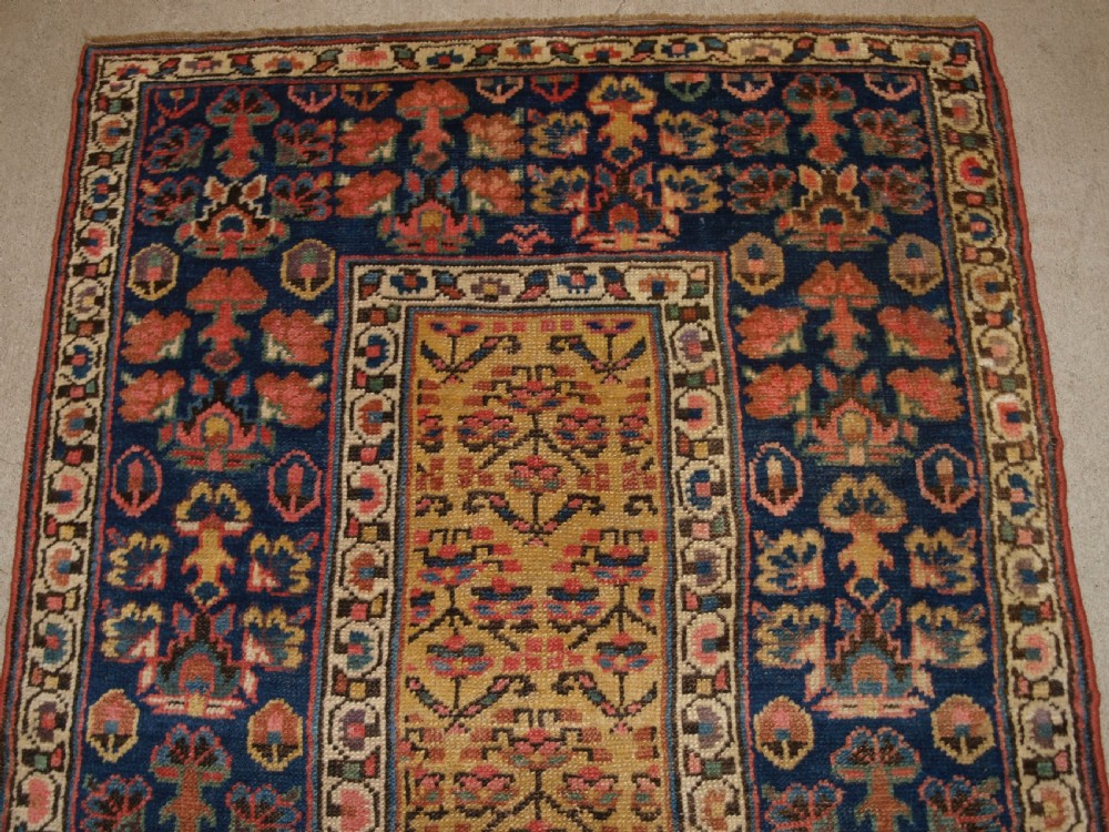 ANTIQUE KURDISH RUNNER, SHRUB DESIGN ON A YELLOW GROUND, CIRCA 1880. View II