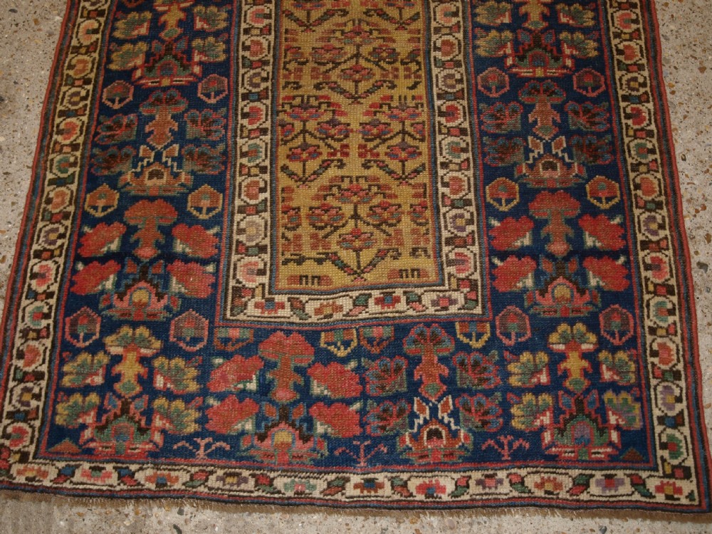 ANTIQUE KURDISH RUNNER, SHRUB DESIGN ON A YELLOW GROUND, CIRCA 1880. View VII