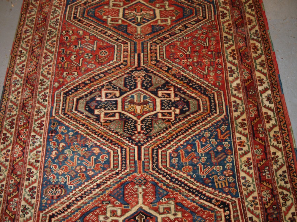 ANTIQUE TRIBAL QASHQAI RUG, TRIPLE MEDALLION WITH SUPERB COLOUR, LATE 19TH CENTURY. View V