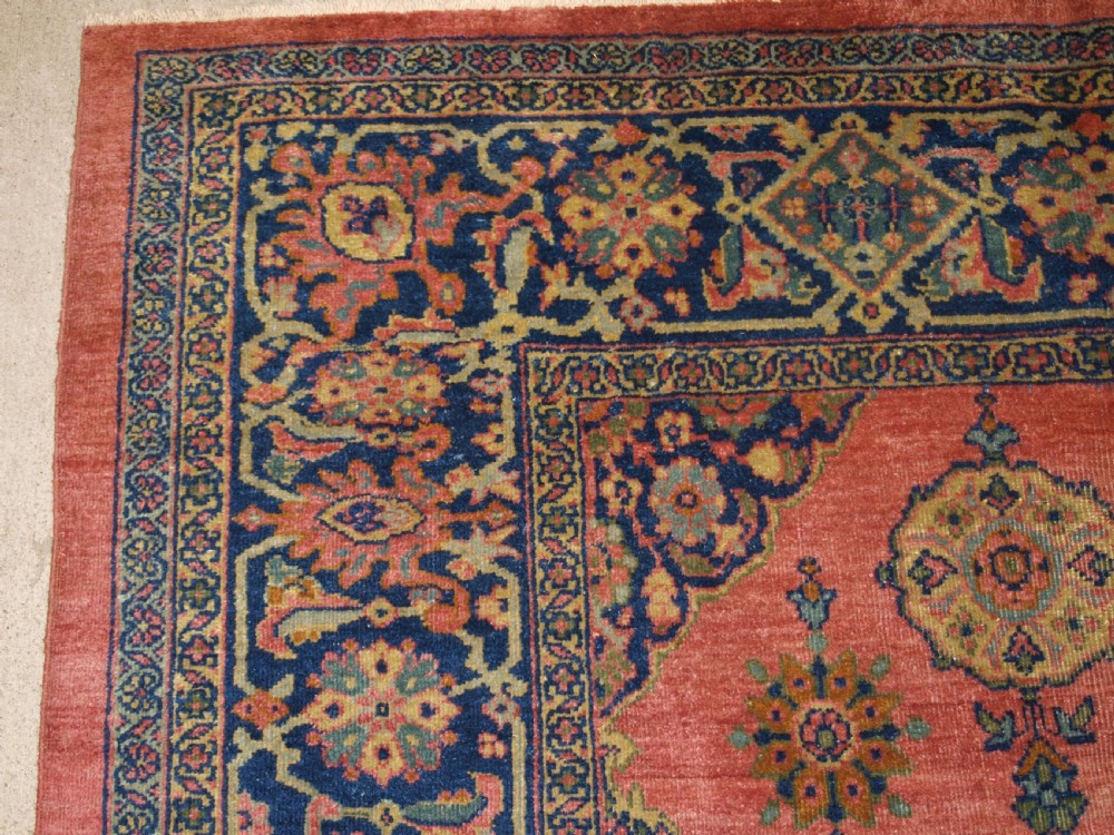 ANTIQUE PERSIAN ZIEGLER MAHAL, ROSE CORAL GROUND, SMALL MEDALLION DESIGN, LATE 19TH CENTURY. View II