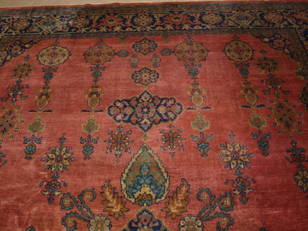 ANTIQUE PERSIAN ZIEGLER MAHAL, ROSE CORAL GROUND, SMALL MEDALLION DESIGN, LATE 19TH CENTURY. View V