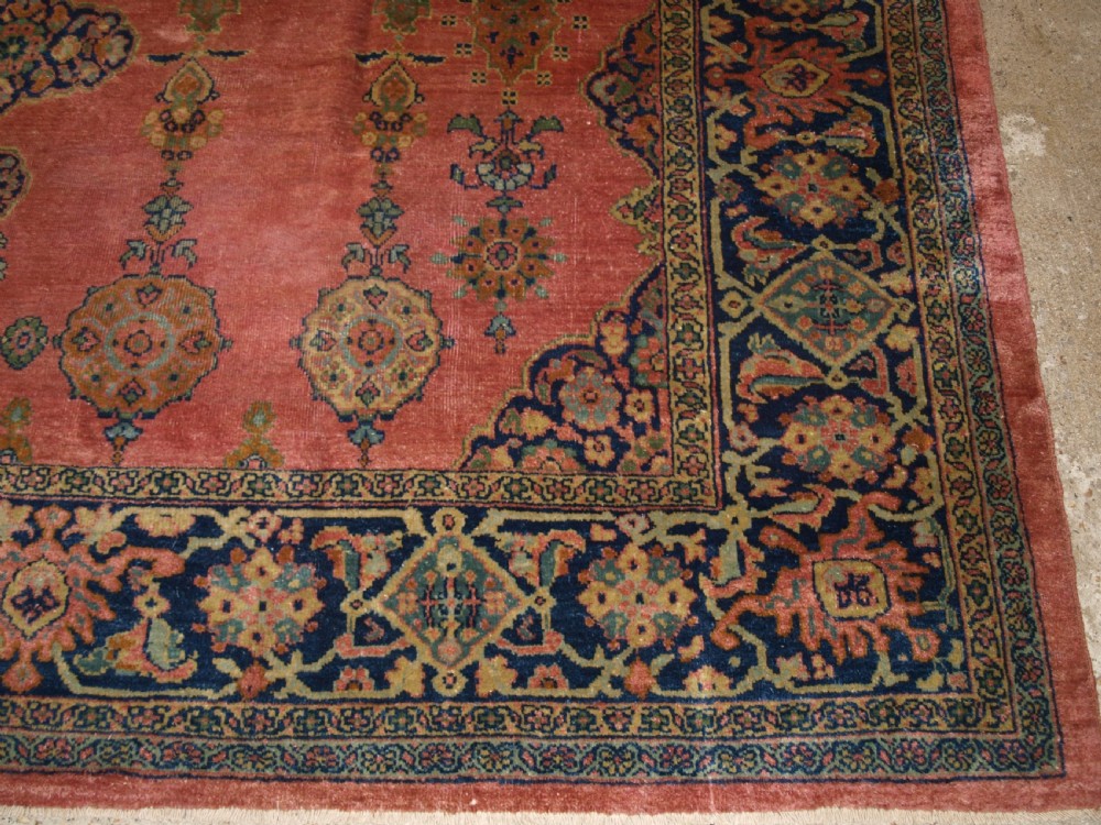 ANTIQUE PERSIAN ZIEGLER MAHAL, ROSE CORAL GROUND, SMALL MEDALLION DESIGN, LATE 19TH CENTURY. View IX
