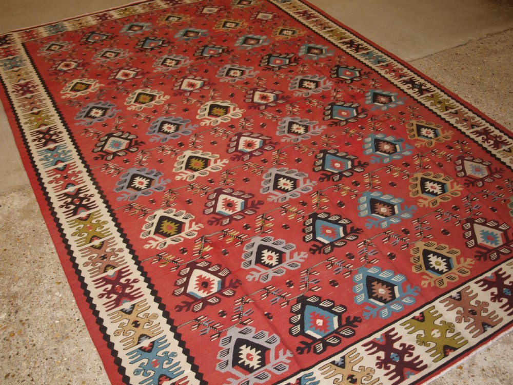 OLD SHARKOY KILIM WITH SOFT COLOUR, TRADITIONAL REPEAT DESIGN, CIRCA 1920. View II