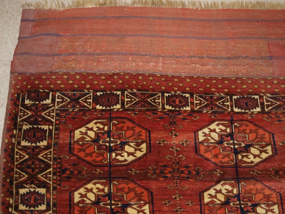 ANTIQUE TEKKE TURKMEN MAIN CARPET WITH RARE OCTAGONAL GULS, MID 19TH CENTURY. View II