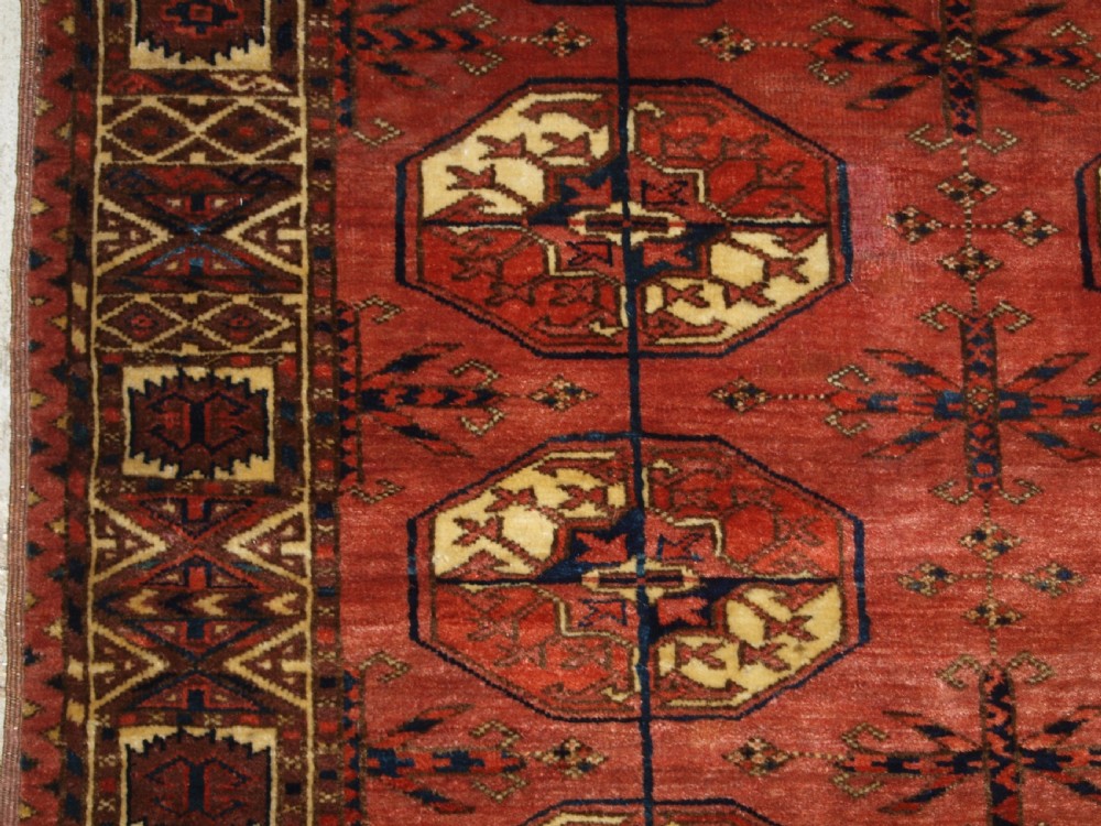 ANTIQUE TEKKE TURKMEN MAIN CARPET WITH RARE OCTAGONAL GULS, MID 19TH CENTURY. View III