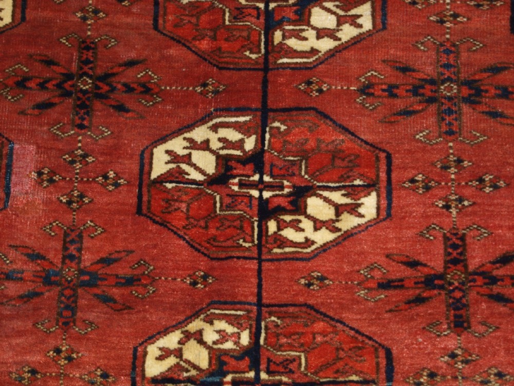 ANTIQUE TEKKE TURKMEN MAIN CARPET WITH RARE OCTAGONAL GULS, MID 19TH CENTURY. View VII