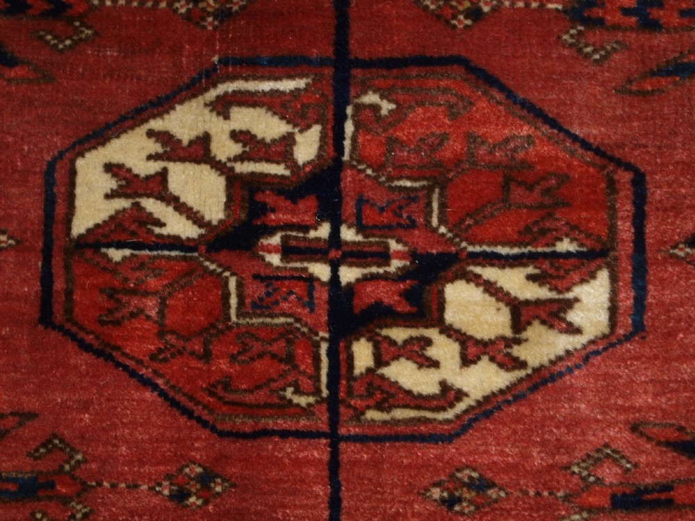 ANTIQUE TEKKE TURKMEN MAIN CARPET WITH RARE OCTAGONAL GULS, MID 19TH CENTURY. View VIII