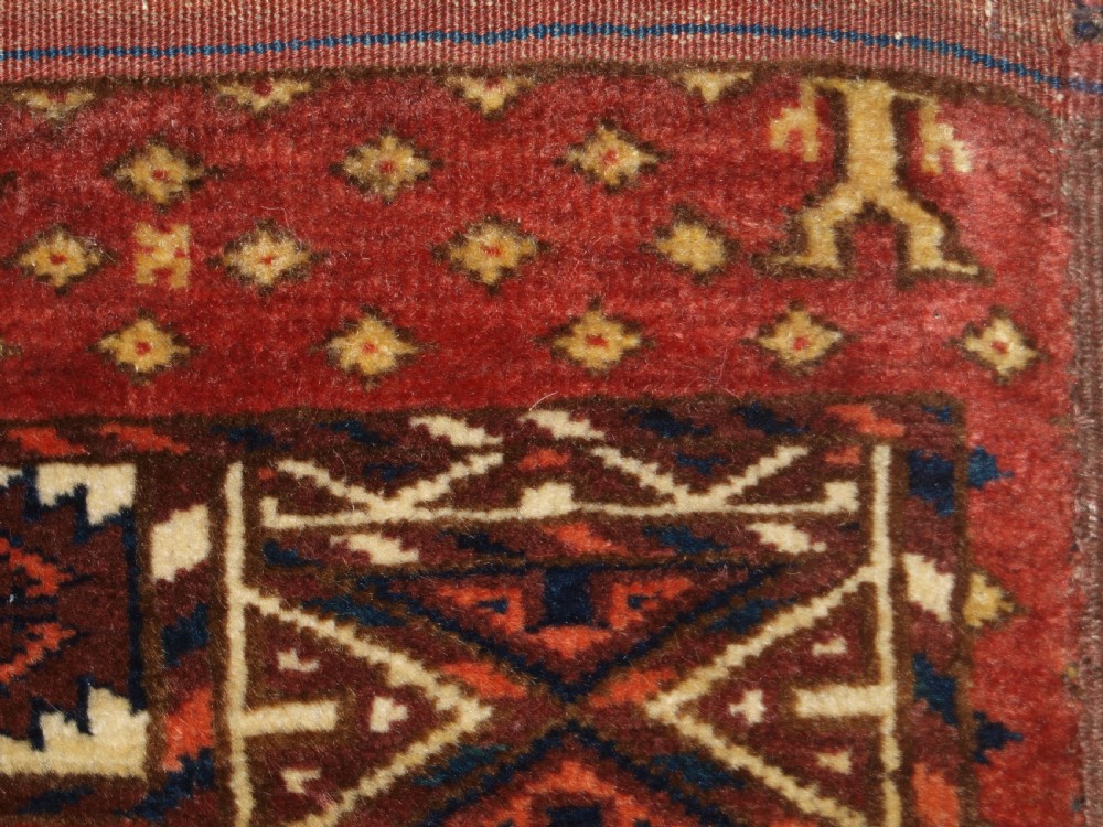 ANTIQUE TEKKE TURKMEN MAIN CARPET WITH RARE OCTAGONAL GULS, MID 19TH CENTURY. View X