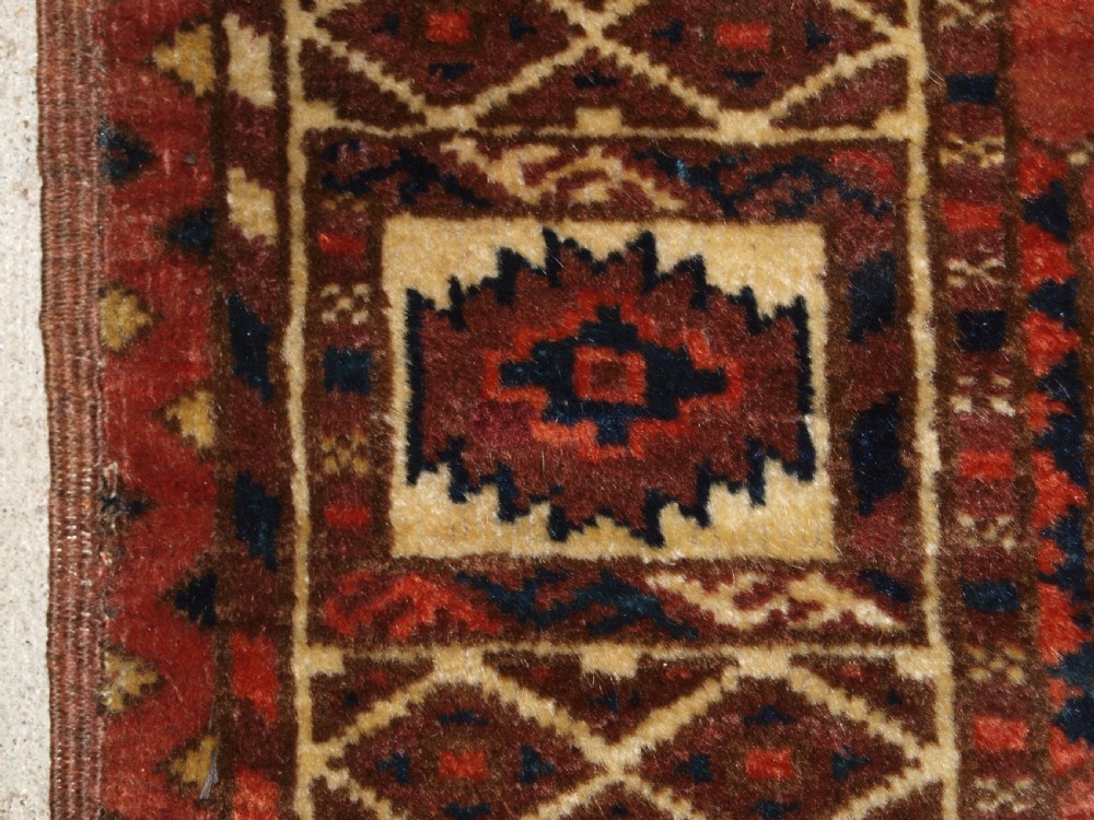 ANTIQUE TEKKE TURKMEN MAIN CARPET WITH RARE OCTAGONAL GULS, MID 19TH CENTURY. View XII