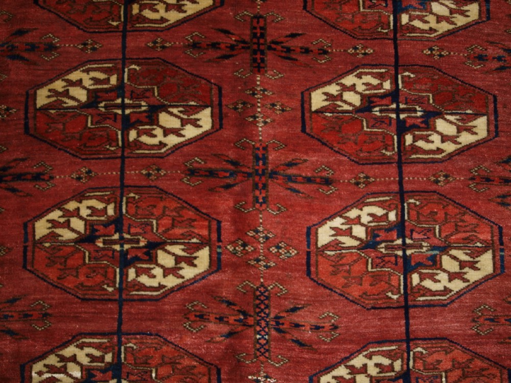 ANTIQUE TEKKE TURKMEN MAIN CARPET WITH RARE OCTAGONAL GULS, MID 19TH CENTURY. View XIV