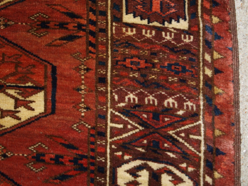 ANTIQUE TEKKE TURKMEN MAIN CARPET WITH RARE OCTAGONAL GULS, MID 19TH CENTURY. View XV