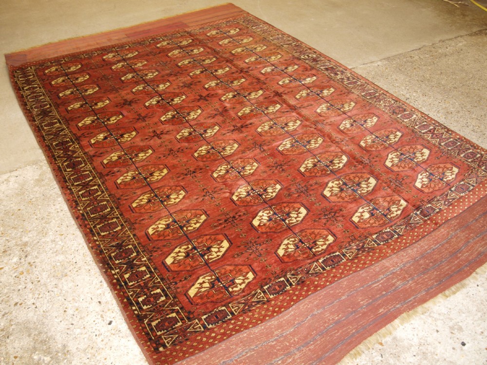 ANTIQUE TEKKE TURKMEN MAIN CARPET WITH RARE OCTAGONAL GULS, MID 19TH CENTURY. View XVI
