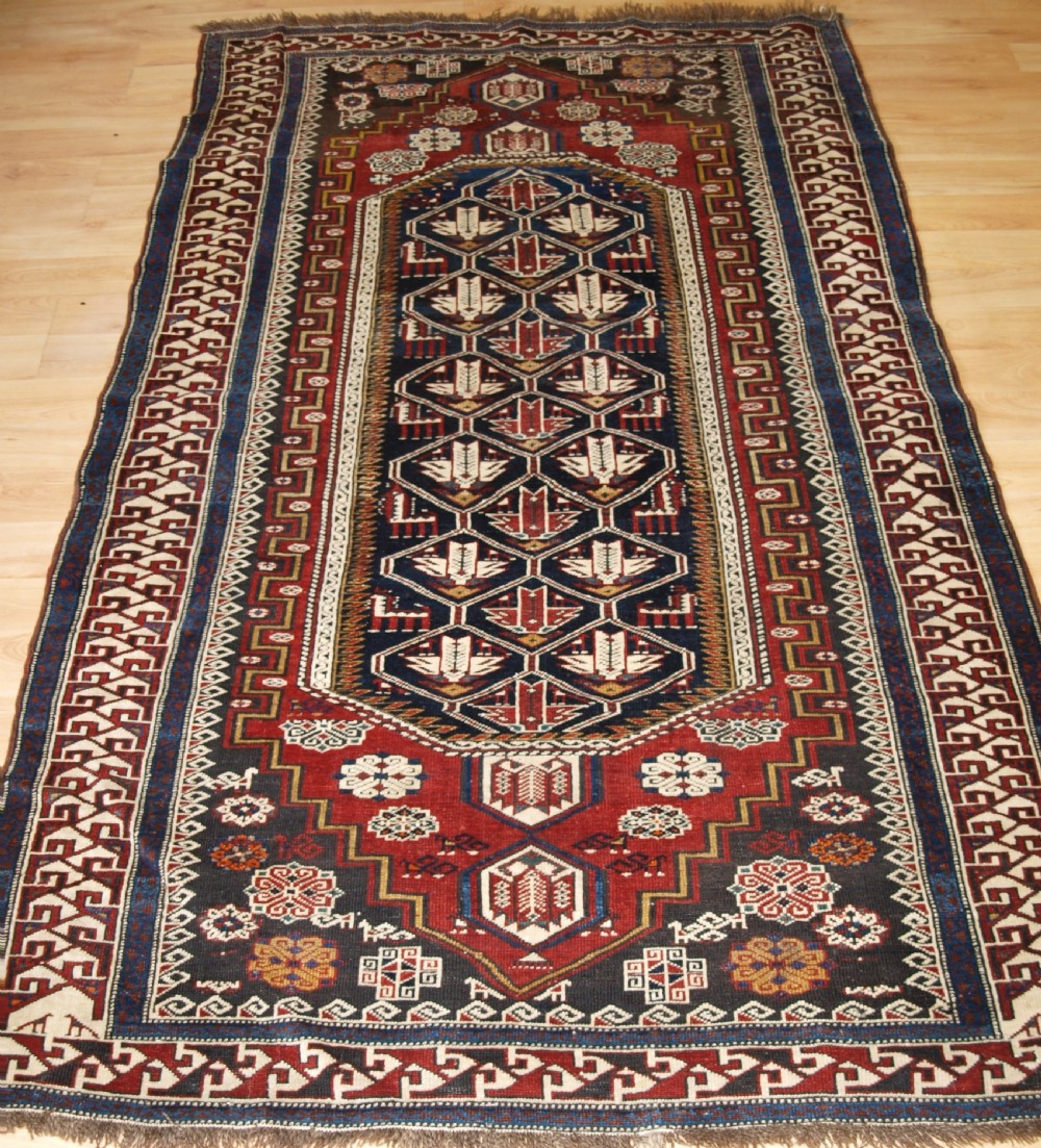 ANTIQUE CAUCASIAN SHIRVAN RUG OF THE BIRD DESIGN, CIRCA 1900.