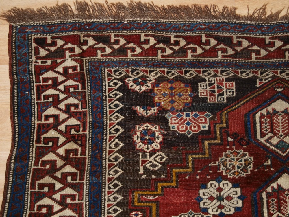 ANTIQUE CAUCASIAN SHIRVAN RUG OF THE BIRD DESIGN, CIRCA 1900. View III