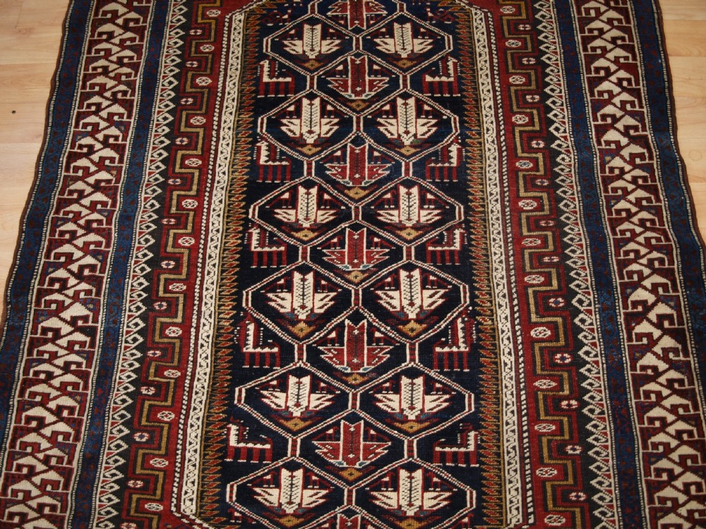 ANTIQUE CAUCASIAN SHIRVAN RUG OF THE BIRD DESIGN, CIRCA 1900. View VI