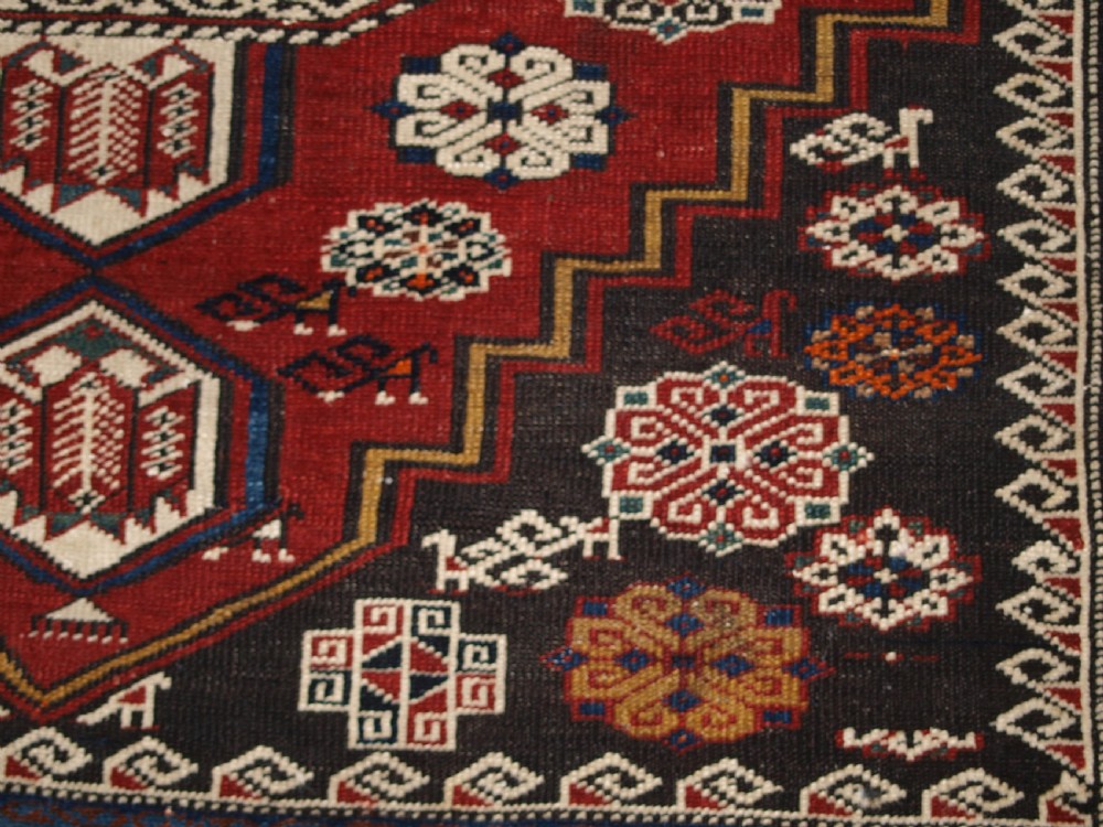 ANTIQUE CAUCASIAN SHIRVAN RUG OF THE BIRD DESIGN, CIRCA 1900. View IX