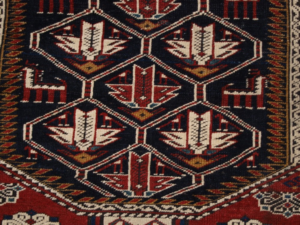 ANTIQUE CAUCASIAN SHIRVAN RUG OF THE BIRD DESIGN, CIRCA 1900. View X