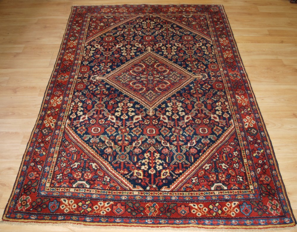 ANTIQUE MAHAL RUG WITH SHRUB DESIGN, SUPERB COLOURS, CIRCA 1900.