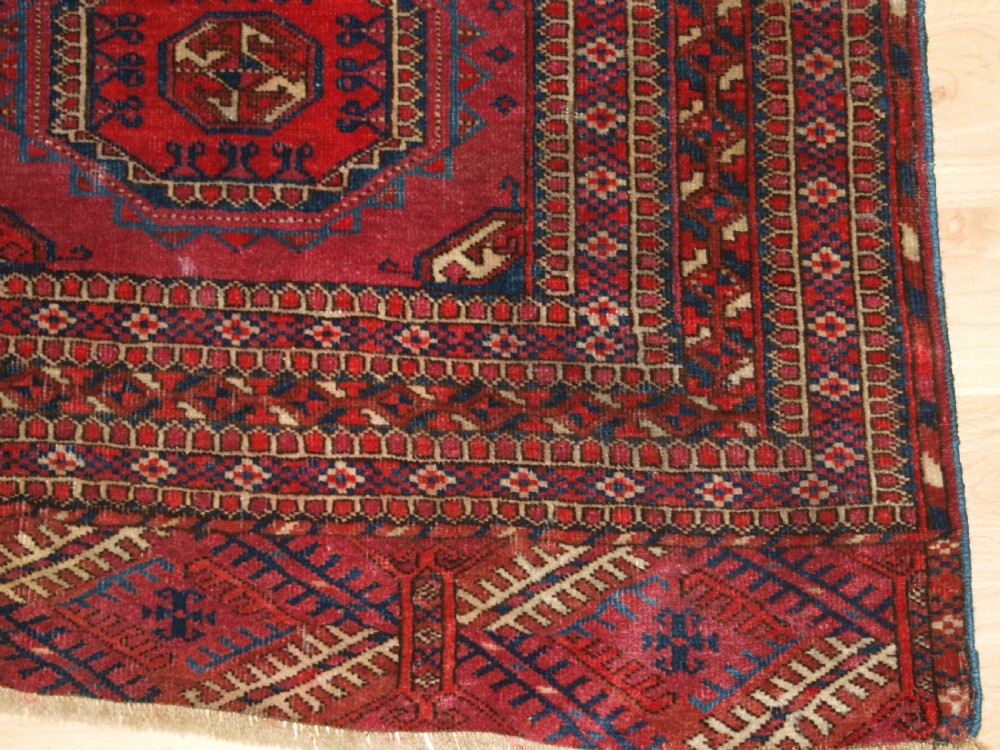 ANTIQUE TEKKE TURKMEN RUG WITH SALOR GULS, COCHINEAL COLOUR, CIRCA 1890. View XI