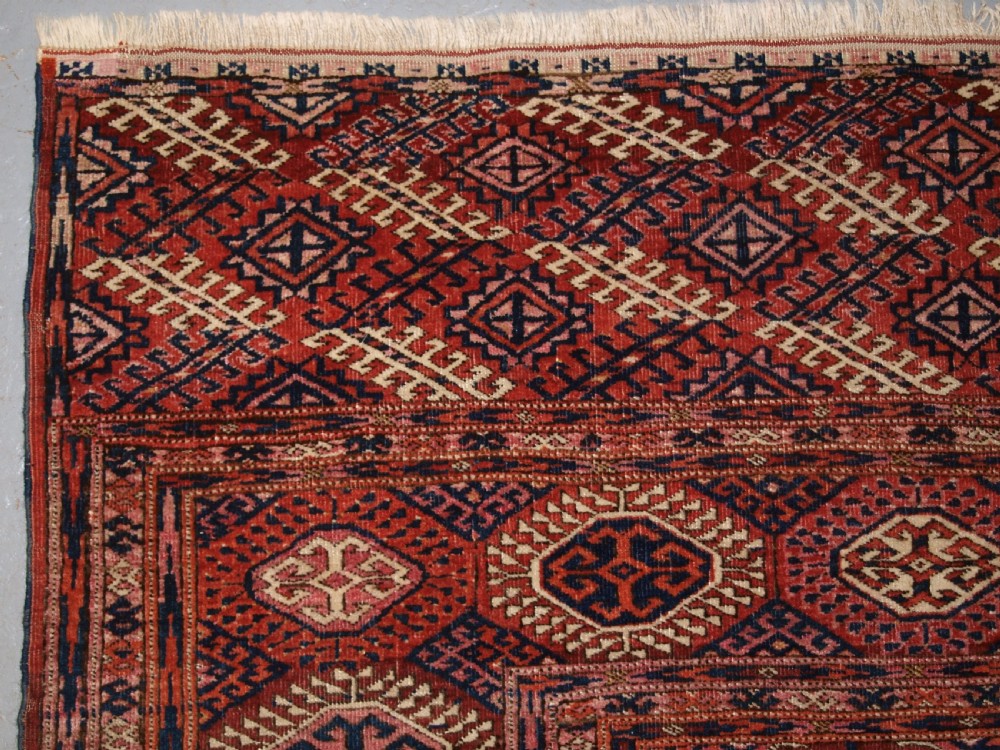 ANTIQUE TEKKE TURKMEN MAIN CARPET OF LARGE SIZE, SUPERB COLOUR CIRCA 1890. View II