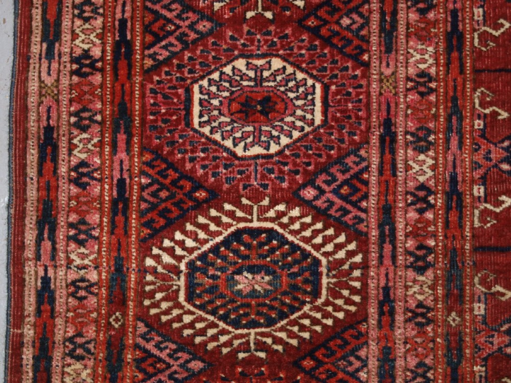 ANTIQUE TEKKE TURKMEN MAIN CARPET OF LARGE SIZE, SUPERB COLOUR CIRCA 1890. View III