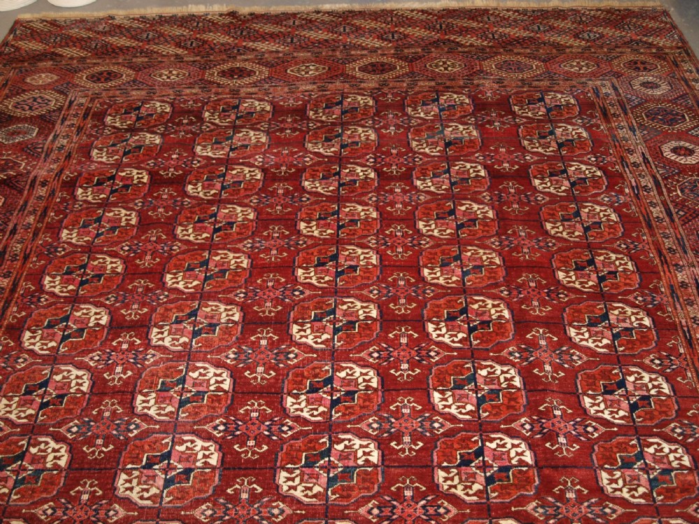 ANTIQUE TEKKE TURKMEN MAIN CARPET OF LARGE SIZE, SUPERB COLOUR CIRCA 1890. View IV