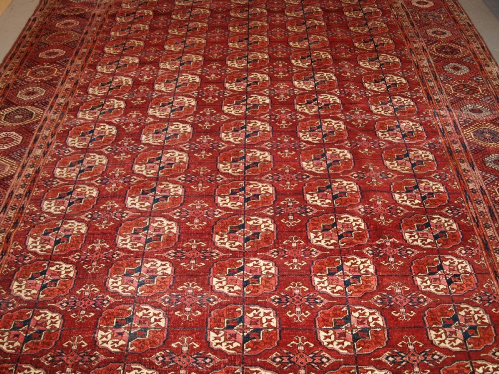 ANTIQUE TEKKE TURKMEN MAIN CARPET OF LARGE SIZE, SUPERB COLOUR CIRCA 1890. View V