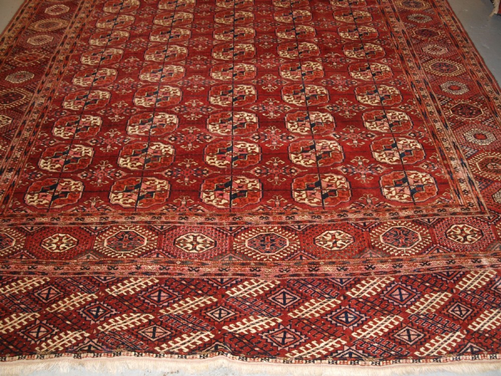 ANTIQUE TEKKE TURKMEN MAIN CARPET OF LARGE SIZE, SUPERB COLOUR CIRCA 1890. View VI