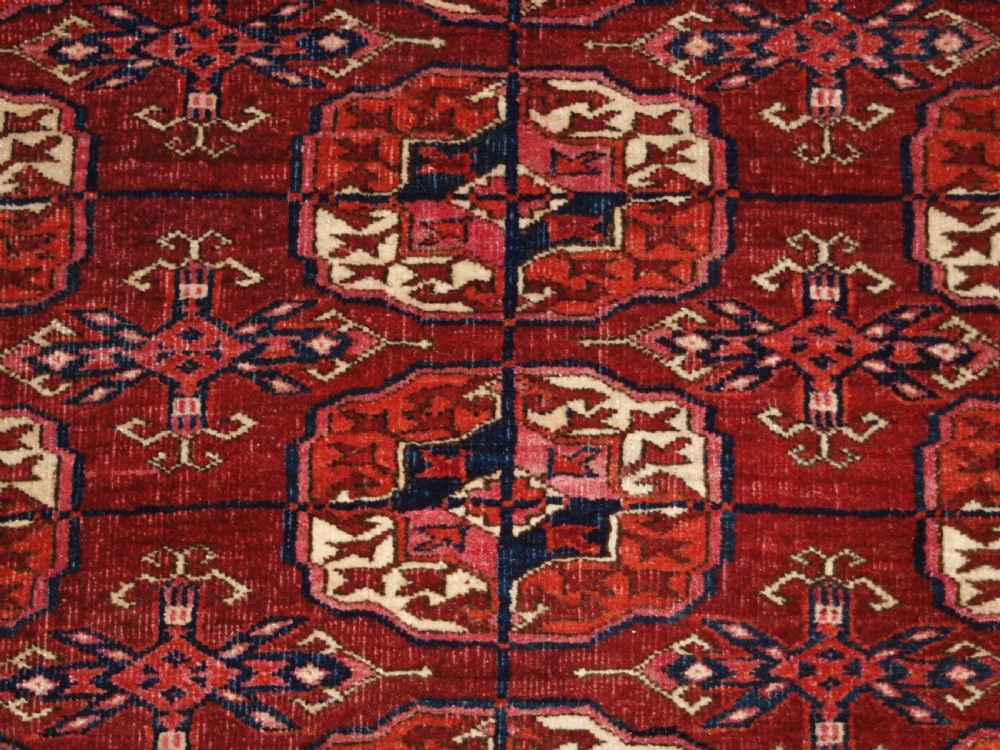 ANTIQUE TEKKE TURKMEN MAIN CARPET OF LARGE SIZE, SUPERB COLOUR CIRCA 1890. View VIII