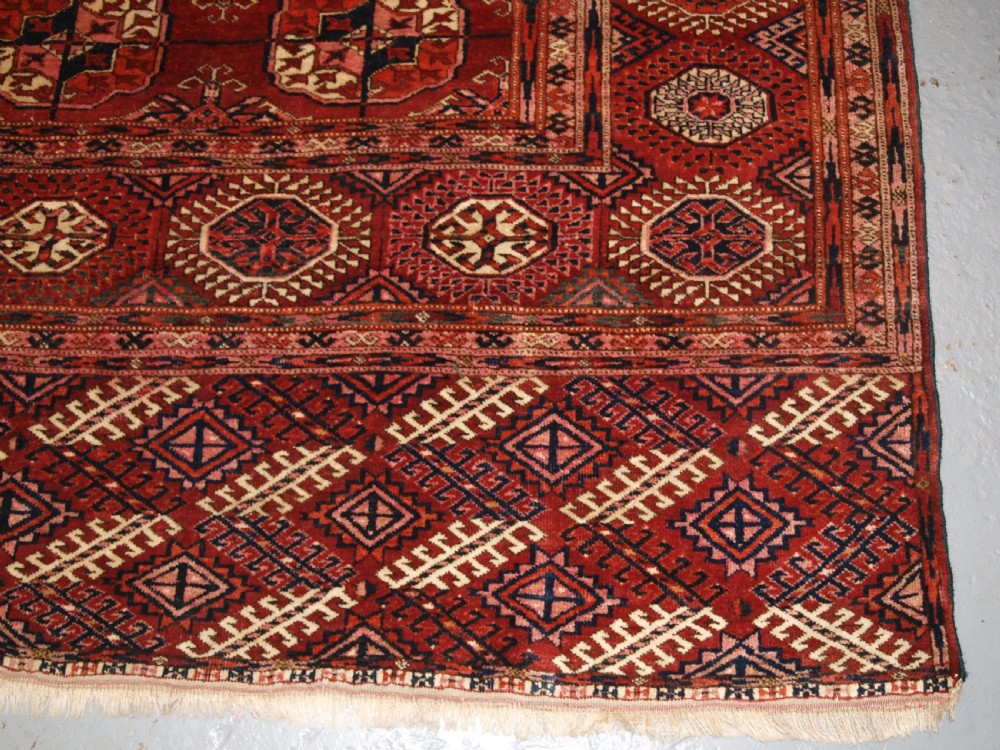 ANTIQUE TEKKE TURKMEN MAIN CARPET OF LARGE SIZE, SUPERB COLOUR CIRCA 1890. View IX