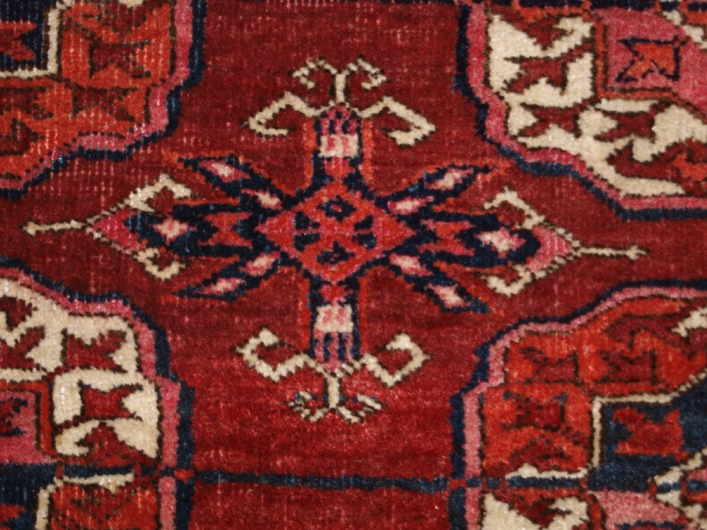 ANTIQUE TEKKE TURKMEN MAIN CARPET OF LARGE SIZE, SUPERB COLOUR CIRCA 1890. View X