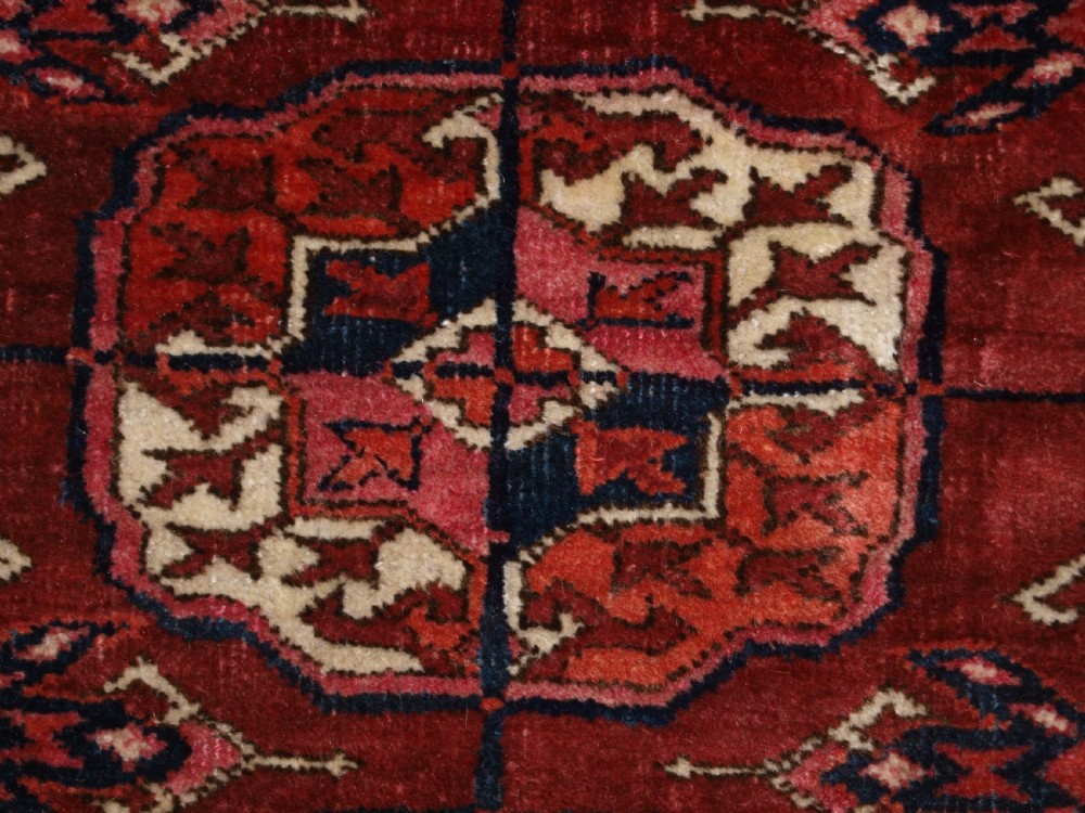ANTIQUE TEKKE TURKMEN MAIN CARPET OF LARGE SIZE, SUPERB COLOUR CIRCA 1890. View XI