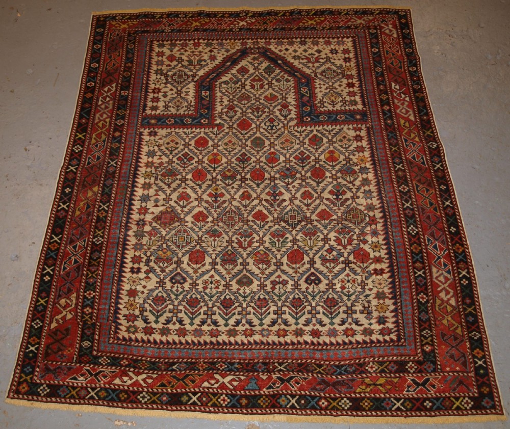 ANTIQUE CAUCASIAN DAGHESTAN PRAYER RUG, FLORAL LATTICE DESIGN, SUPERB, CIRCA 1880.