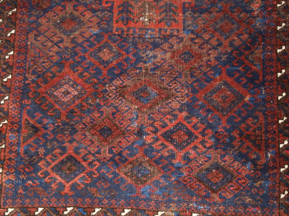 ANTIQUE TIMURI BALUCH RUG OF SINGLE MEDALLION DESIGN, CIRCA 1880. View X