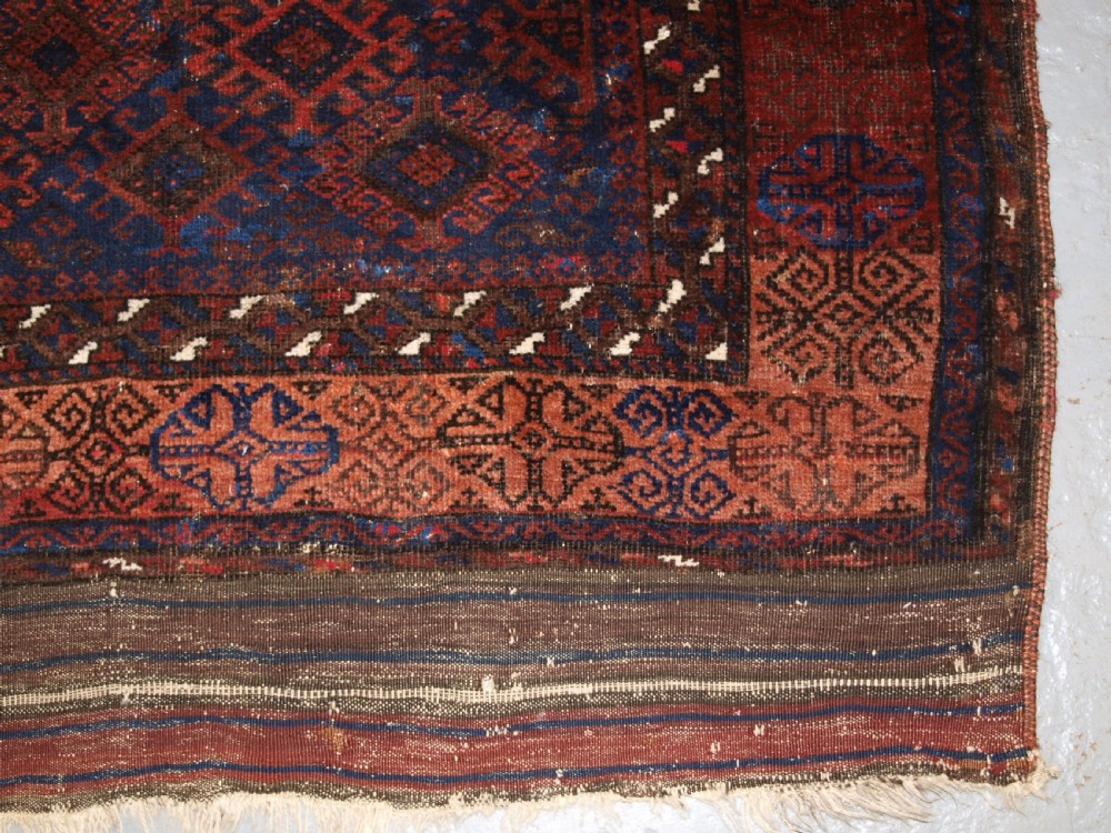ANTIQUE TIMURI BALUCH RUG OF SINGLE MEDALLION DESIGN, CIRCA 1880. View XI