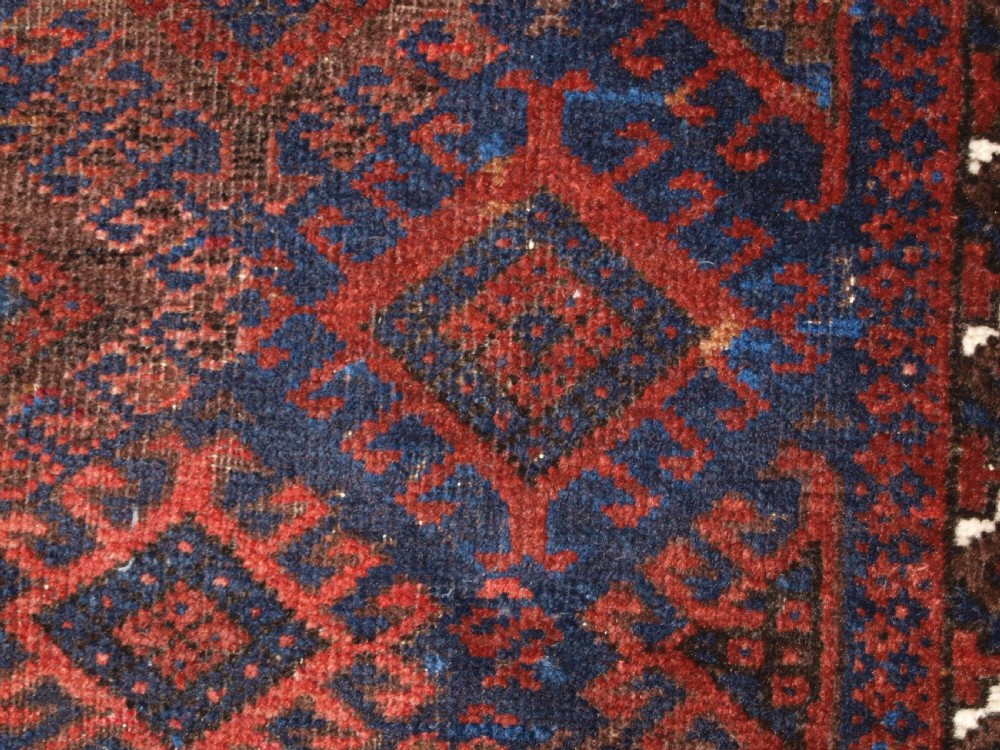 ANTIQUE TIMURI BALUCH RUG OF SINGLE MEDALLION DESIGN, CIRCA 1880. View XII