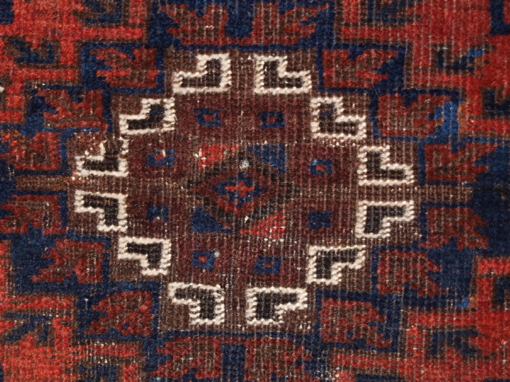 ANTIQUE TIMURI BALUCH RUG OF SINGLE MEDALLION DESIGN, CIRCA 1880. View XIII