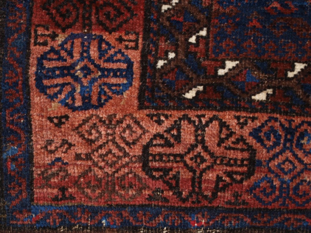 ANTIQUE TIMURI BALUCH RUG OF SINGLE MEDALLION DESIGN, CIRCA 1880. View XVI