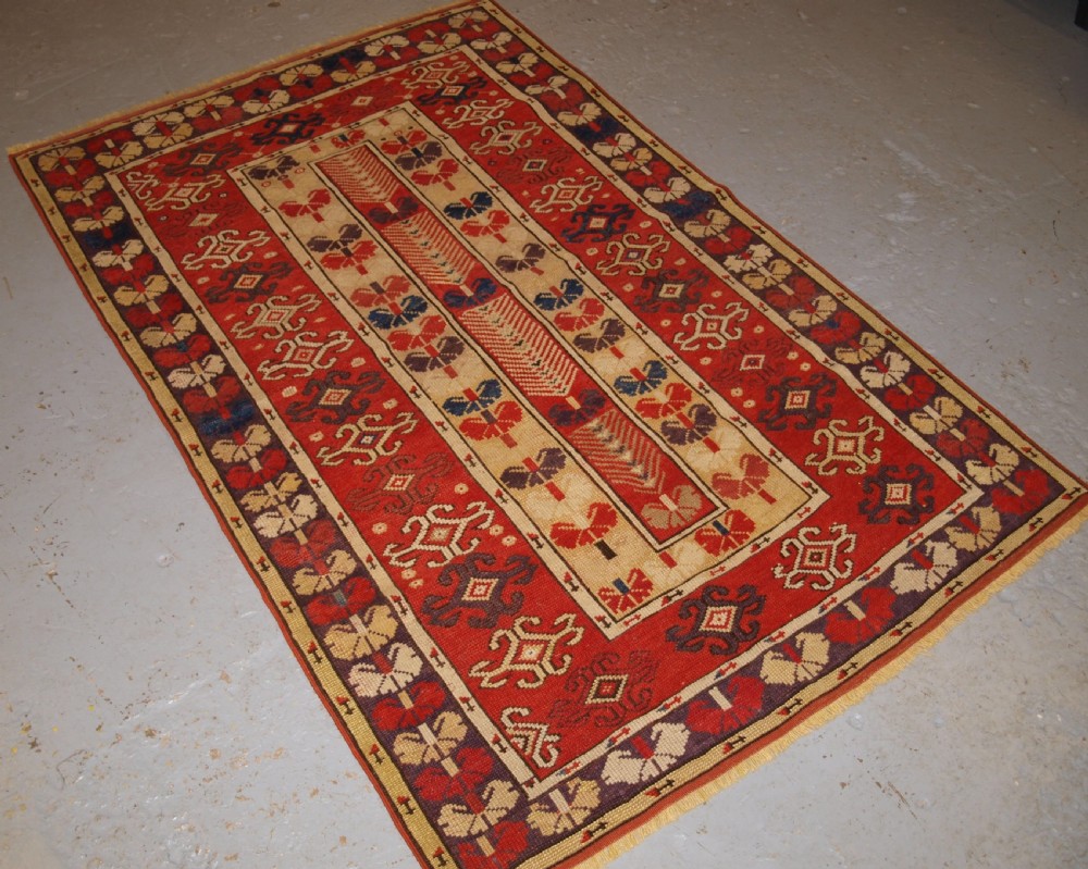 ANTIQUE TURKISH MILAS VILLAGE RUG OF SCARCE DESIGN, CIRCA 1850. View II