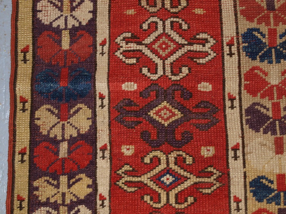 ANTIQUE TURKISH MILAS VILLAGE RUG OF SCARCE DESIGN, CIRCA 1850. View IV