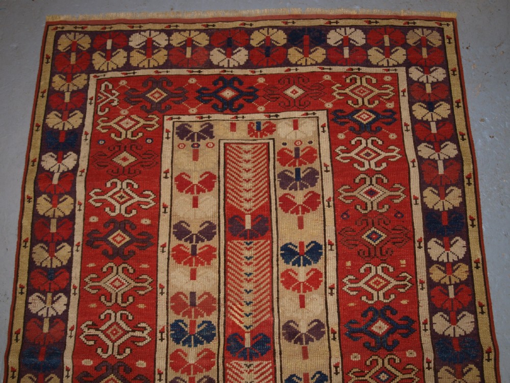 ANTIQUE TURKISH MILAS VILLAGE RUG OF SCARCE DESIGN, CIRCA 1850. View V