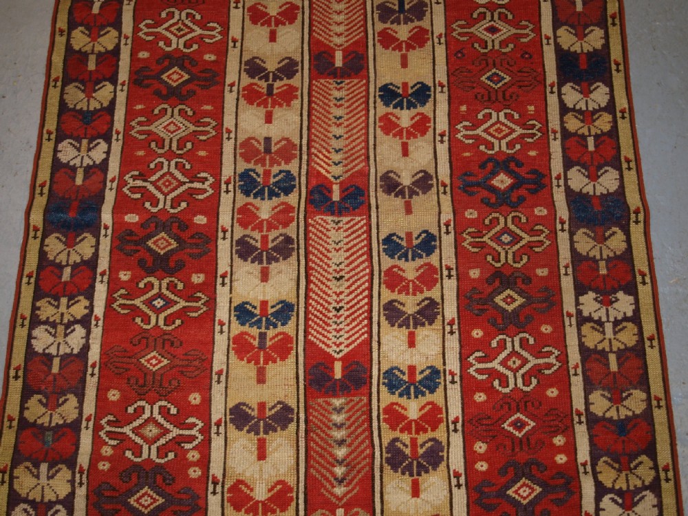 ANTIQUE TURKISH MILAS VILLAGE RUG OF SCARCE DESIGN, CIRCA 1850. View VI
