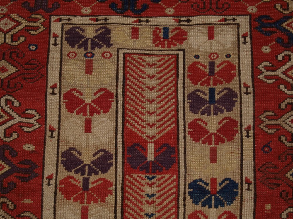 ANTIQUE TURKISH MILAS VILLAGE RUG OF SCARCE DESIGN, CIRCA 1850. View VIII