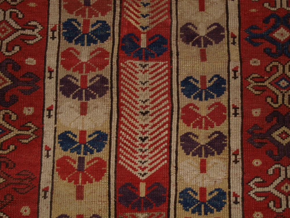 ANTIQUE TURKISH MILAS VILLAGE RUG OF SCARCE DESIGN, CIRCA 1850. View X